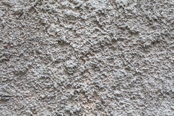 Текстура грубая штукатурка на стене — стоковое фото