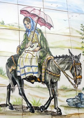 Azulejo meisje met paraplu rijden een ezel