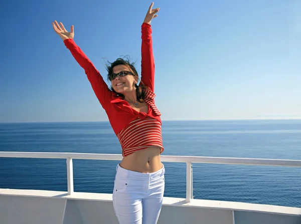 Happy lady on liner on seascape background — Stock Photo, Image