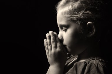 Praying child. clipart