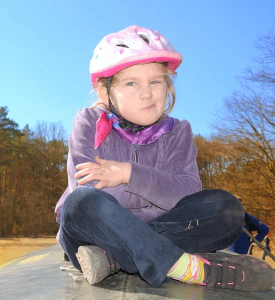 Child in a bicycle helmet. — Stock Photo, Image