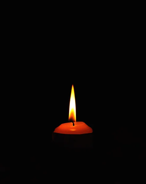 One candle on black backround. — Stock Photo, Image