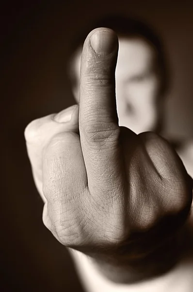 Middle finger as a sign of aggression - Fuck off. — Stock Photo, Image