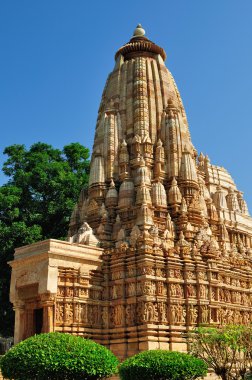 Kamasutra Temple in Khajuraho, India. clipart