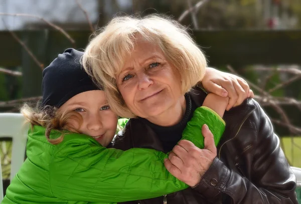 Woman with granddaughter — Stock Photo, Image