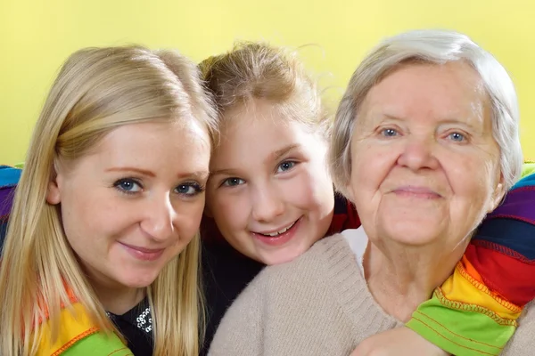 Woman with her granddaughters — Stock Photo, Image