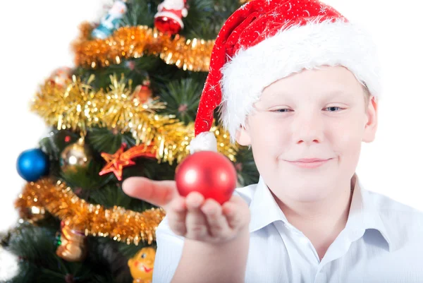 Portrait of a boy on the background of the Christmas tree — Stock Photo, Image