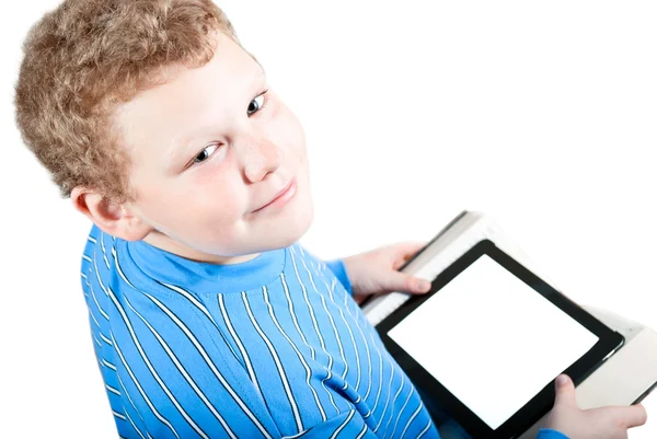 Menino com um computador tablet — Fotografia de Stock