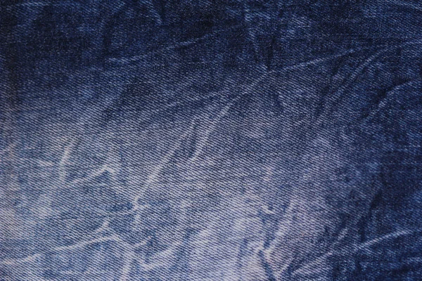 Blauwe jeans textuur met naden. — Stockfoto