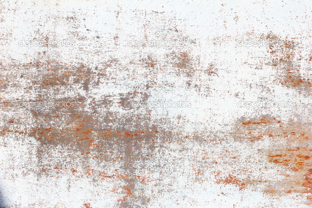 Old worn wall with whitewash and rust