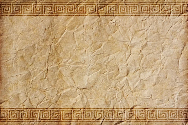 Gamla skrynkligt papper med ornament i grekisk stil Stockbild