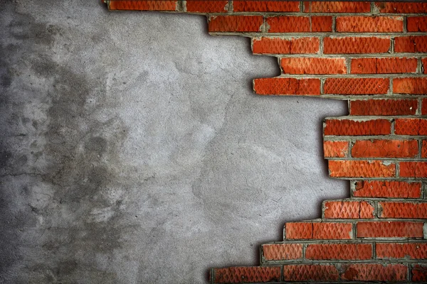 Geruwd muur omgeven door bakstenen Stockafbeelding