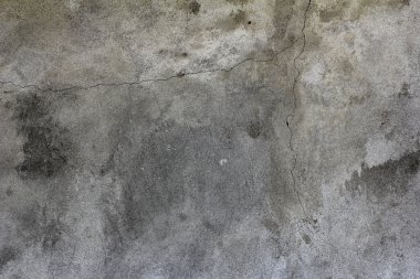 Çatlaklar ile eski beton duvar parçası