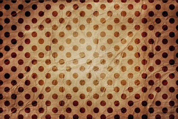 Texture of the old paper with polka dots in brown colors — Stock Photo, Image