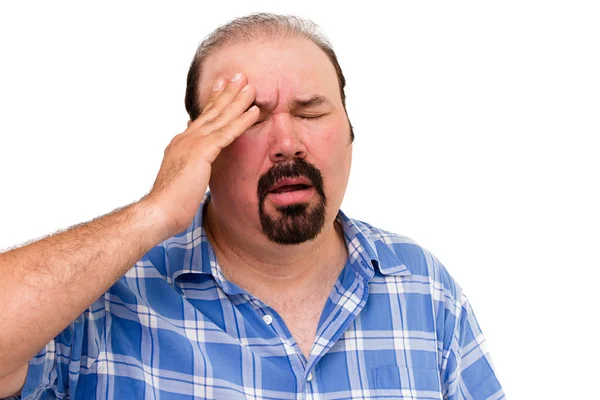 Hombre de mediana edad experimentando un dolor de cabeza — Foto de Stock