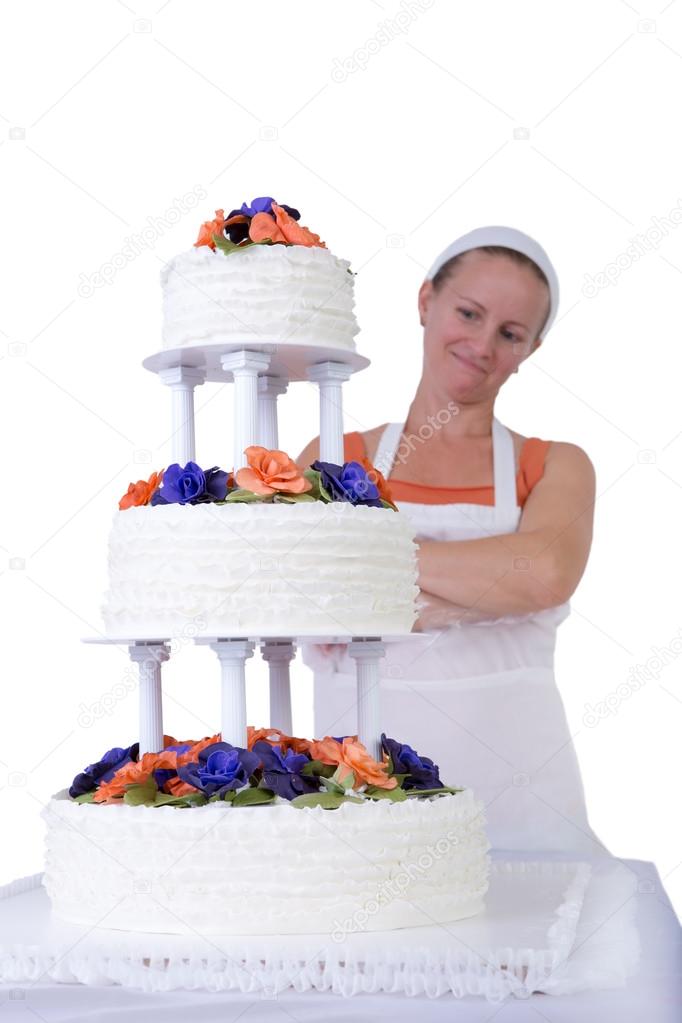 Proud Baker Lady Checking her Ruffled Wedding Cake