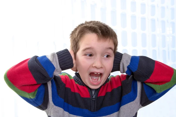 Kid Screams with his Hands on his Ears — Stock Photo, Image