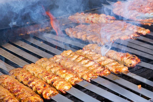 Cooking Adana Lamb Kebabs on the Restaurant Style Grill — Stock Photo, Image