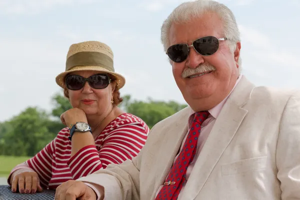 Retired Senior Couple Looking at You with their Eyeglasses — Stock Photo, Image