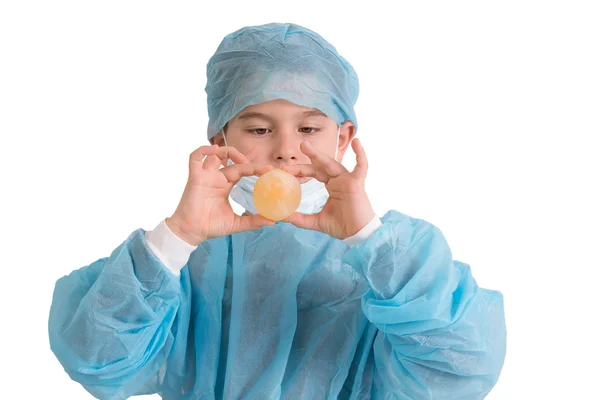 Kid Holding and looking at His Bouncy Egg Elementary School Proj — Stock Photo, Image