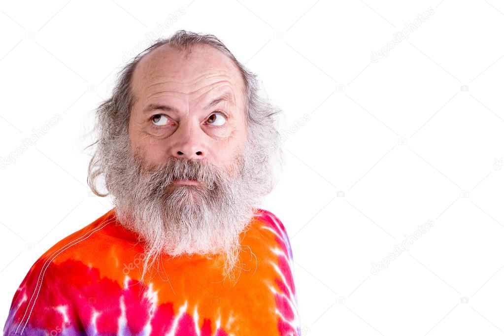 Baby Boomer with his Tie Dye T-Shirt, Thoughtfully Looking up Se