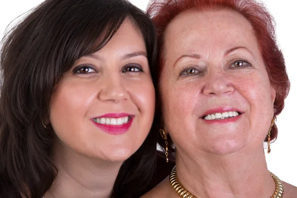 Senior Mother and Middle Age Daughter Cheek to Cheek Stock Image