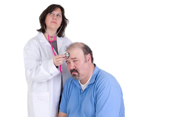 Dag dromen stagiair en haar rustige patiënt — Stockfoto