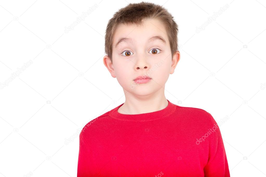 Cute young boy staring in amazement