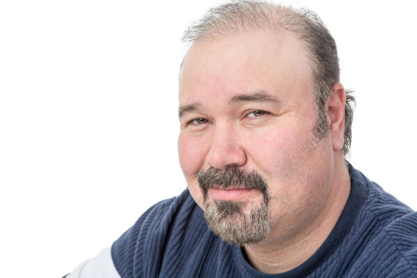 Close-up portrait of a mature man smiling