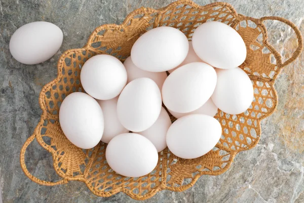 Decorative Easter basket filled with Easter Eggs — Stock Photo, Image