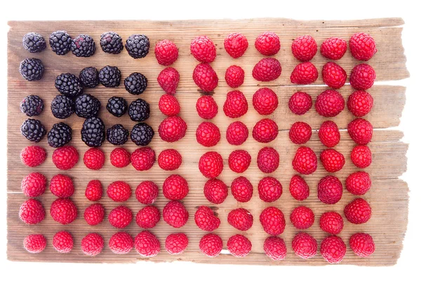 Artistic display of raspberries and blackberries — Stock Photo, Image