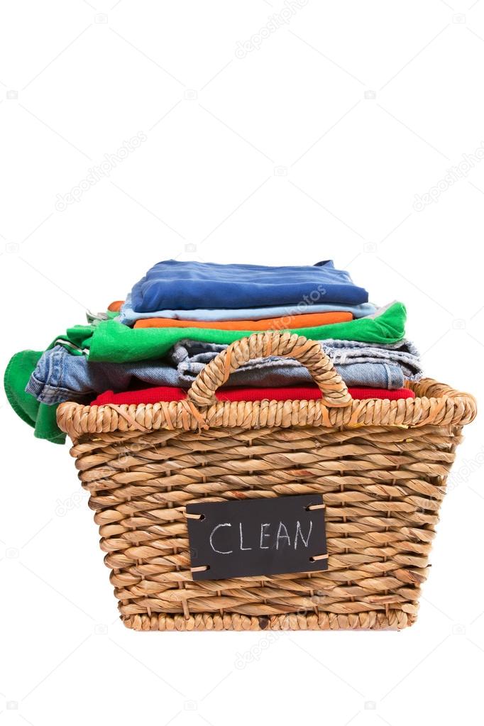 Wicker laundry basket filled with clean clothes