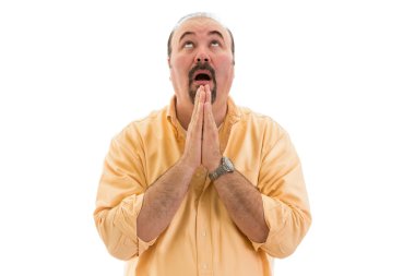 Middle-aged man praying to heaven for help clipart