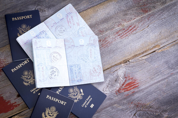 American passports open to reveal stamps