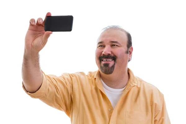 Homem feliz tirando um auto-retrato em seu celular — Fotografia de Stock