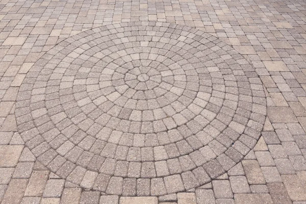 Ornamental pattern in patio paving — Stock Photo, Image