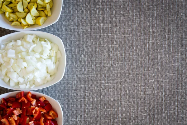 Border of fresh diced vegetables for cooking — Stock Photo, Image