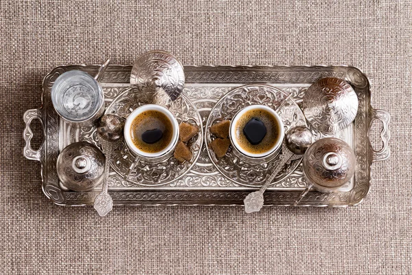 Traditional ornate metal tray with Turkish coffee — Stock Photo, Image