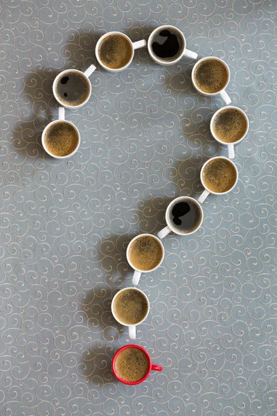 Coffee mugs arranged as a question mark — Stock Photo, Image