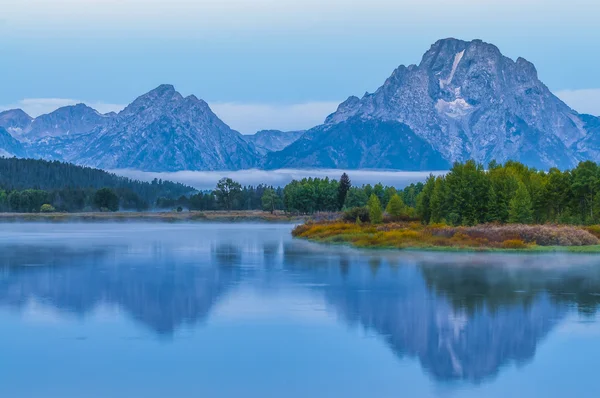 Grand teton reflektion på sunrise — Stockfoto