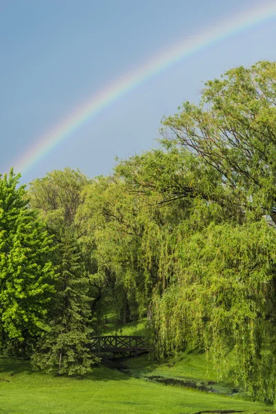 Rainbow over the bridge — Stock Photo, Image