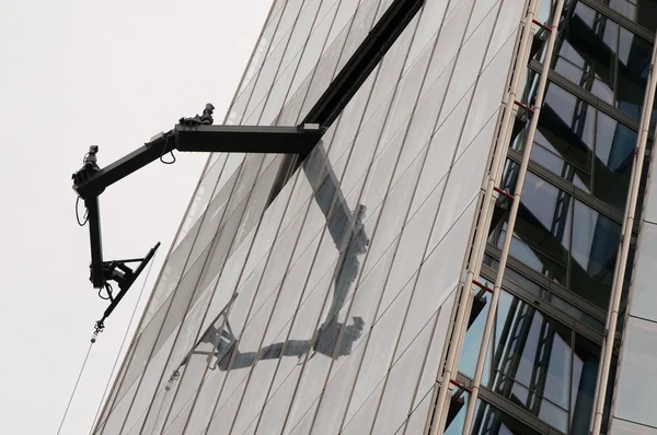 Office block maintenance arm. — Stock Photo, Image