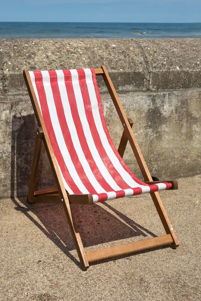 Red and white striped deckchairs — Stock Photo, Image