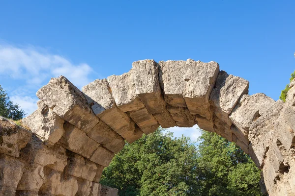 Oude stenen boog in olympia, Griekenland — Stockfoto