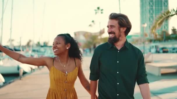 Close Young Happy Man Woman Walking Promenade Holding Hands Joyfully — Stock Video