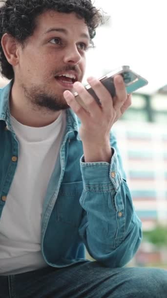 Vertical Video Young Bearded Man Denim Shirt Sitting Using Mobile — Stock Video