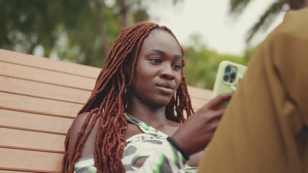 Gorgeous Woman African Braids Wearing Top Using Mobile Phone While — Vídeo de Stock