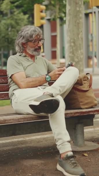 Vertical Video Smiling Middle Aged Man Gray Hair Beard Wearing — Stock Video