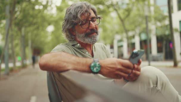 Thoughtful Middle Aged Man Gray Hair Beard Wearing Casual Clothes — Stockvideo