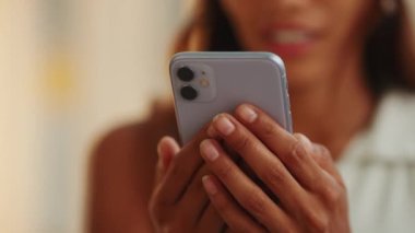 Close-up of girl's hands holding phone